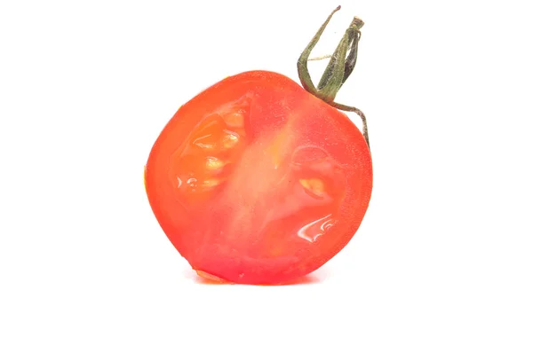 Um pedaço de tomate cereja fresco — Fotografia de Stock