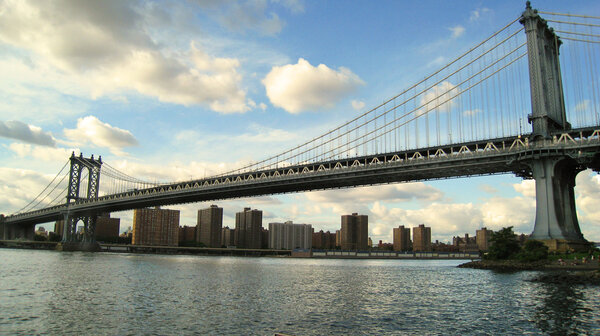 The Manhattan Bridge is a suspension bridge that crosses the East River in New York City, connecting Lower Manhattan (at Canal Street) with Brooklyn