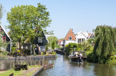 EDAM, HOLLAND - MAY 28: Detail of one of the canal that cross th clipart