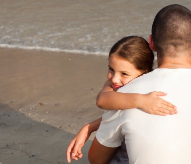 Portrait of a Young Daughter Hugging his father clipart