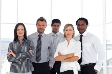 Portrait of a cute group of business looking at the camer clipart