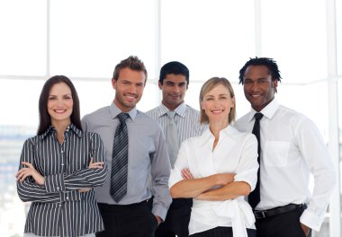 Portrait of a happy group of business looking at the came clipart