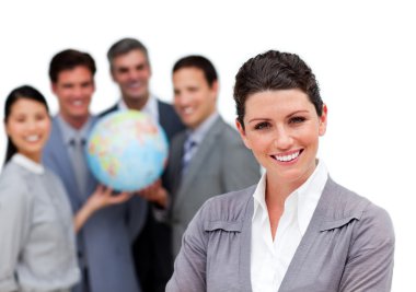 Ambitious business team holding a terrestrial globe clipart