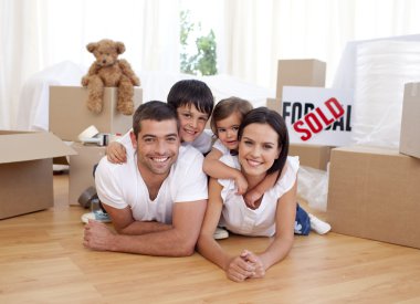 Happy family after buying new house clipart