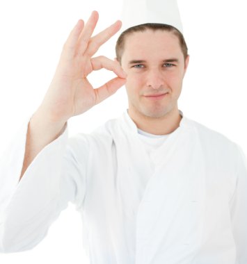 Young cook giving hand signal clipart