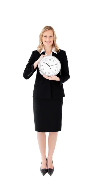 Empresária encantada segurando um relógio — Fotografia de Stock