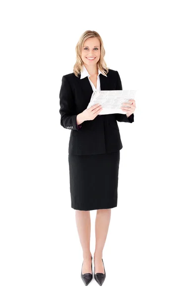 Delighted businesswoman holding a newspaper — Stock Photo, Image