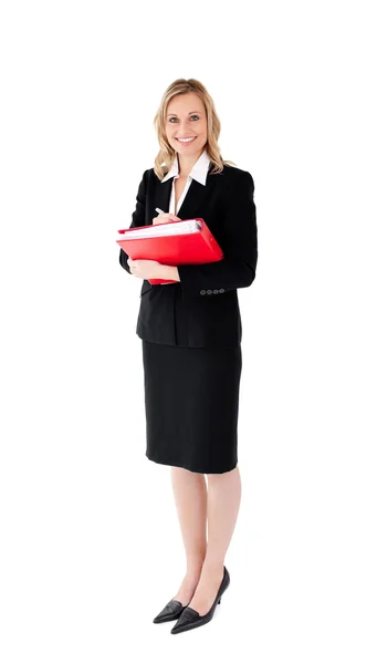 Smiling businesswoman holding a folder — Stock Photo, Image