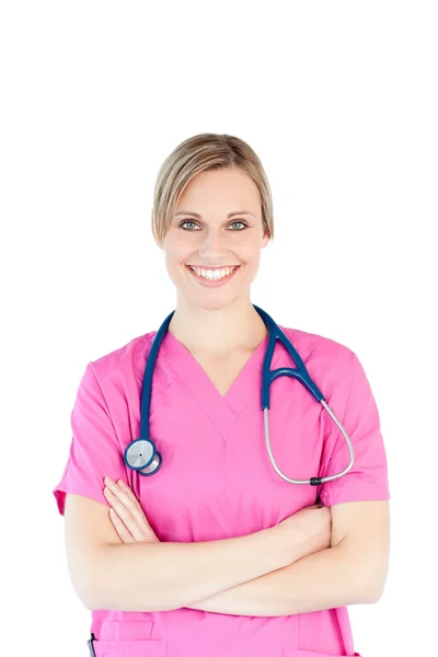 Zadowolona pielęgniarka w różowy odzież robocza — Zdjęcie stockowe