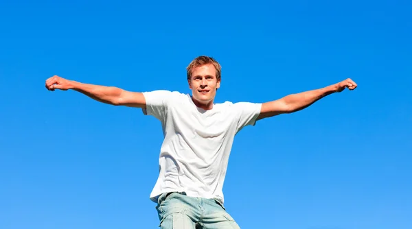 Portrait of a mature Man jumping in the air outdoor — Stock Photo, Image