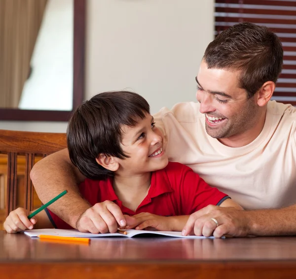Cute boy looking at his father — Stock Photo, Image