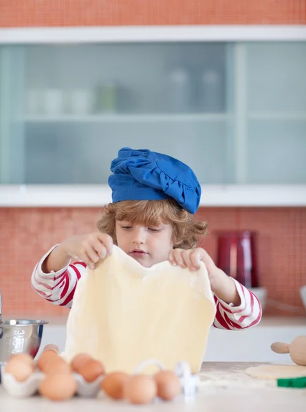 Little boy with dough — Stock Photo, Image