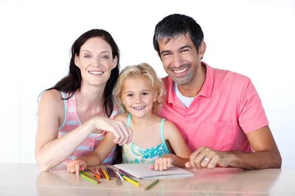 Cheerful parents and daughter smiling at camera — Stock Photo, Image