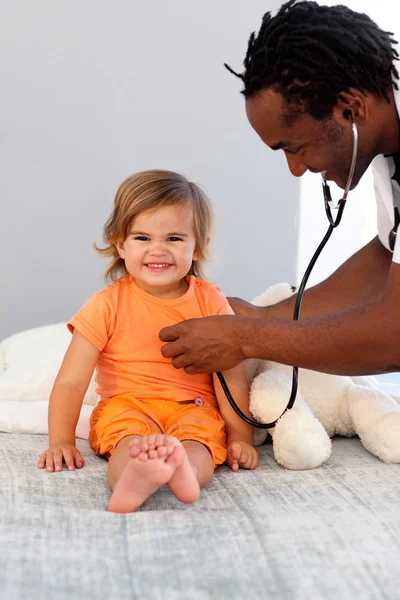 Caring doctor with a child — Stock Photo, Image