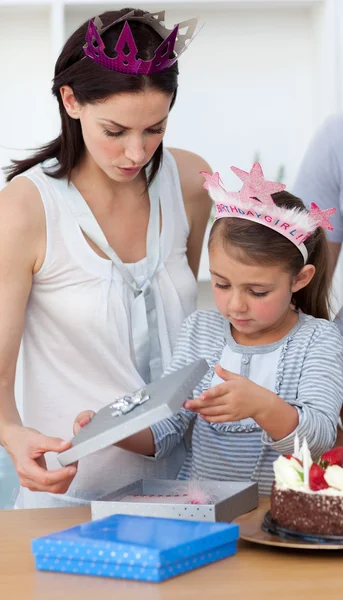 Little girl opening Birthday gifts — Stock Photo, Image
