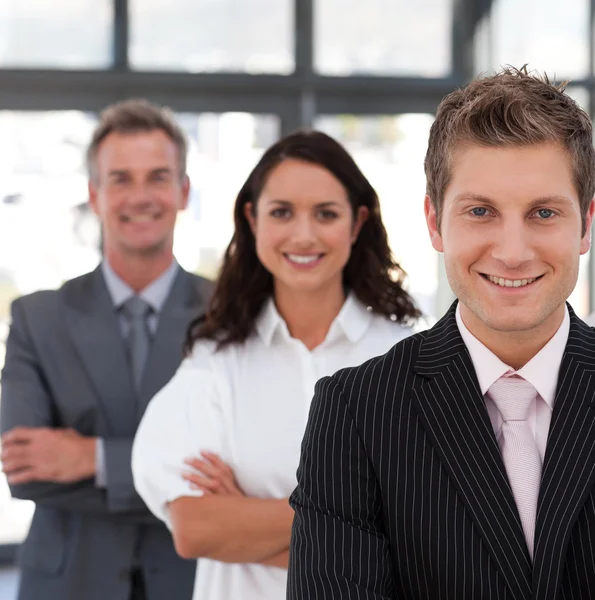 Smiling business team looking at the camera — Stock Photo, Image