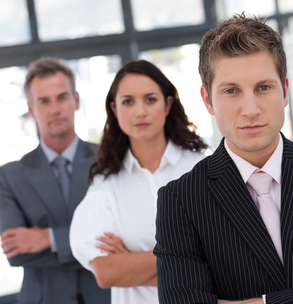 Portrait of a relaxed business team looking at the camera — Stock Photo, Image