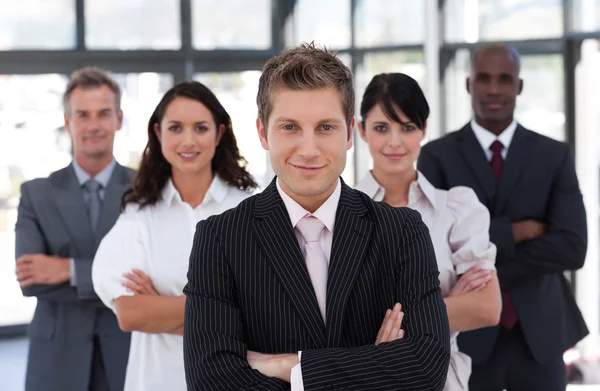 Confident business team looking at the camera — Stock Photo, Image