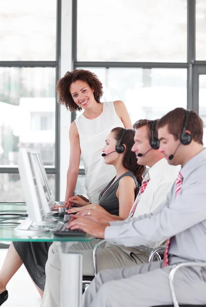 Happy female manager with her sale representative team — Stock Photo, Image
