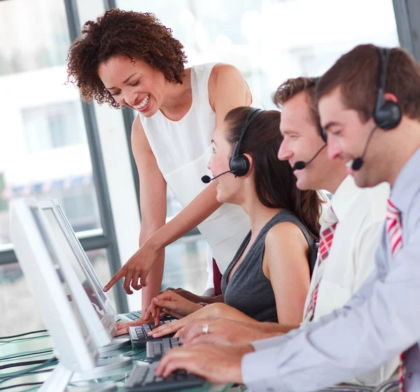 Beautiful female manager with her sale representative team — Stock Photo, Image