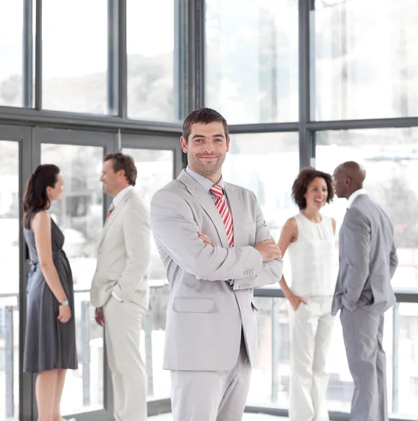 Portrait of a hispanic male manager leading his team — Stock Photo, Image