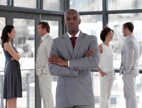 Portrait of an african manager leading his team — Stock Photo, Image