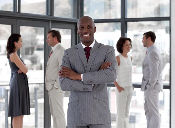 Portrait of an afro male manager leading his team — Stock Photo, Image