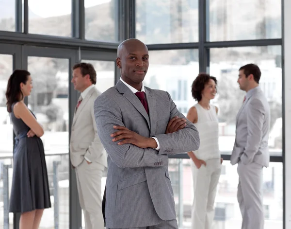 Portrait of a confident male manager leading his team — Stock Photo, Image