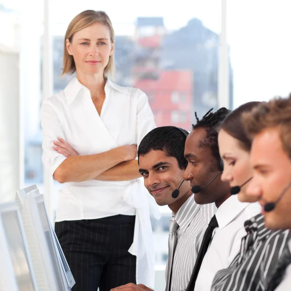 Blond manager leading her representative team — Stock Photo, Image