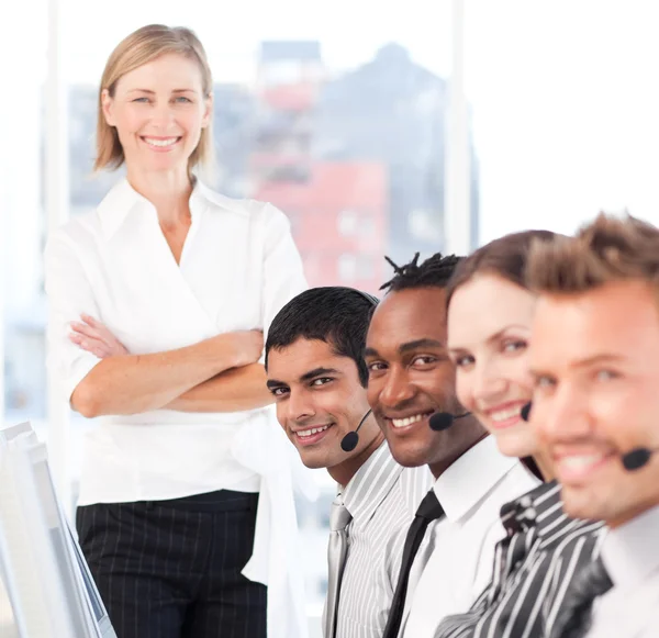Happy manager leading her representative team — Stock Photo, Image
