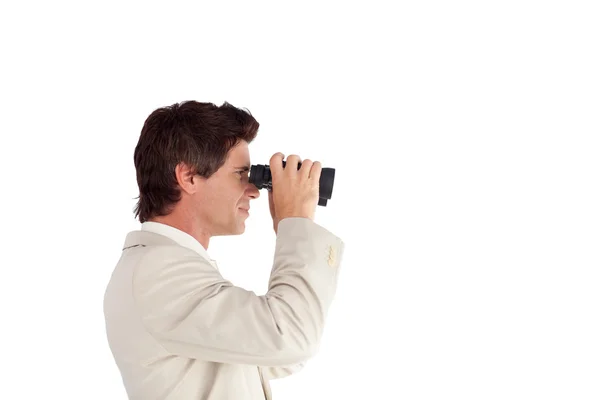 Caucasian businessman with binoculars — Stock Photo, Image