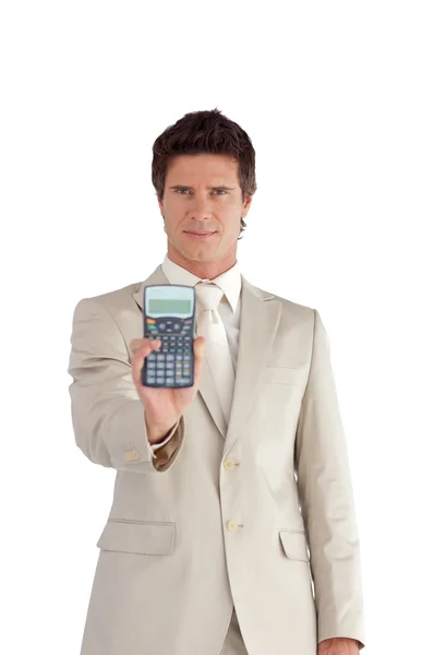 Jovem Empresário Segurando uma calculadora em suas mãos — Fotografia de Stock
