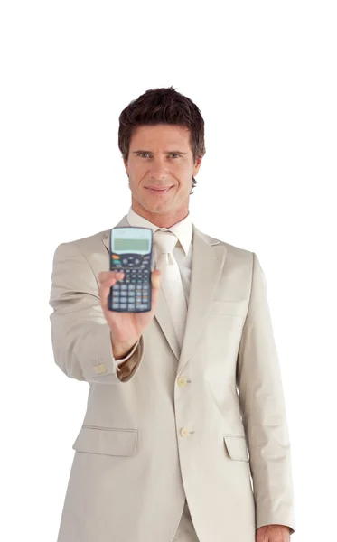 Бизнесмен держит в руках калькулятор — стоковое фото