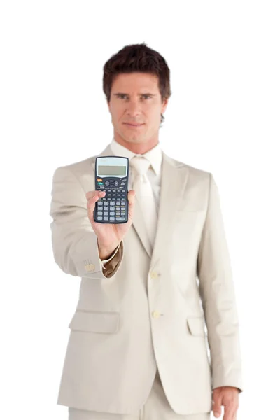Uomo d'affari felice Tenendo in mano una calcolatrice — Foto Stock