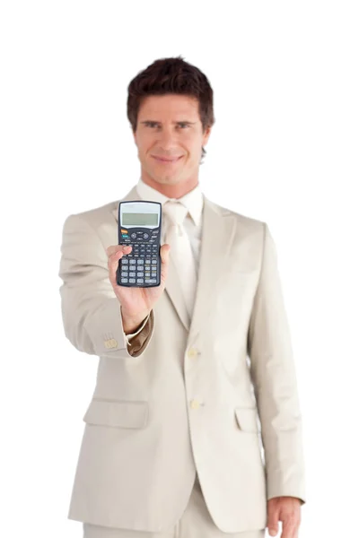 Leende affärsman håller en miniräknare i hans händer — Stockfoto