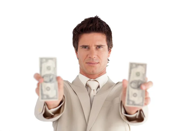 Привлекательный бизнесмен с долларами — стоковое фото