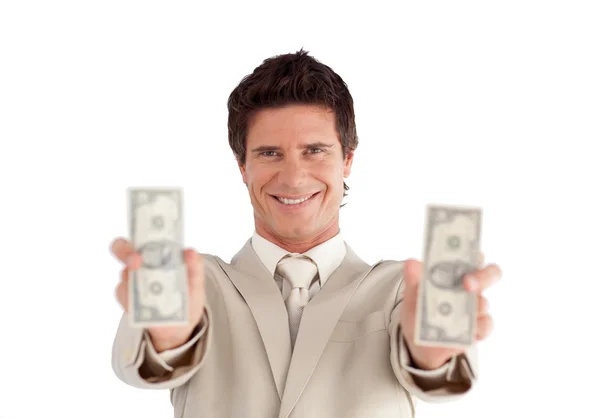 Uomo d'affari caucasico che tiene dollari — Foto Stock