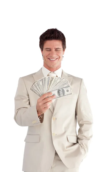 Уверенный бизнесмен, держащий доллары — стоковое фото