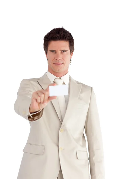 Handsome businessman holding a white card — Stock Photo, Image