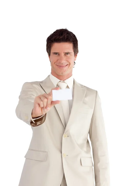 Empresário carismático segurando um cartão branco — Fotografia de Stock