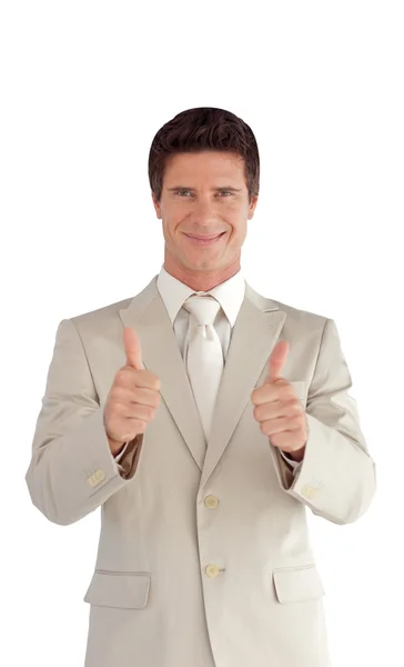 Self-assured businessman making a thumb-up — Stock Photo, Image