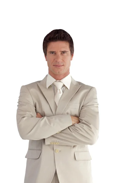 Confident businessman standing at the camera — Stock Photo, Image