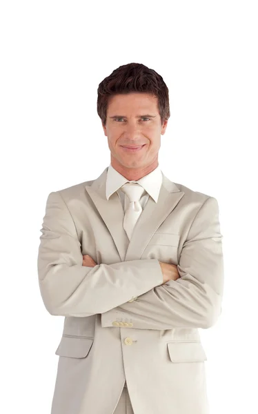 Smiling businessman standing at the camera — Stock Photo, Image