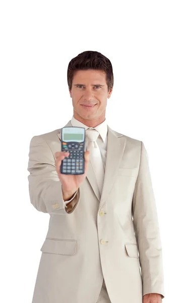 Bonito empresário mostrando uma calculadora — Fotografia de Stock