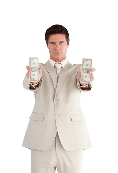 Lachende zakenman met dollars op zijn handen — Stockfoto
