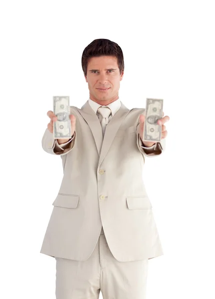 Уверенный бизнесмен с долларами на руках — стоковое фото