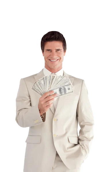 Белый бизнесмен с долларами на руках — стоковое фото