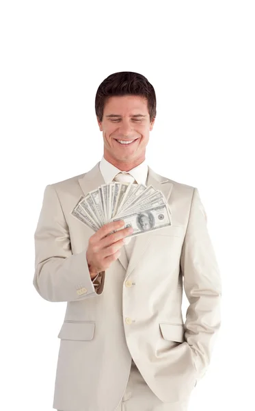Бизнесмен с долларами на руках — стоковое фото