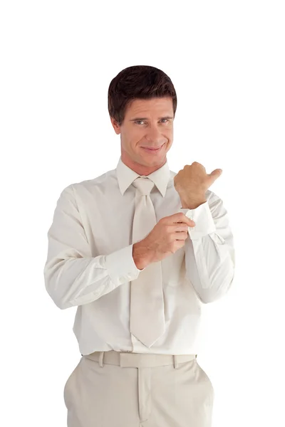 Empresário carismático ajustando seu terno — Fotografia de Stock