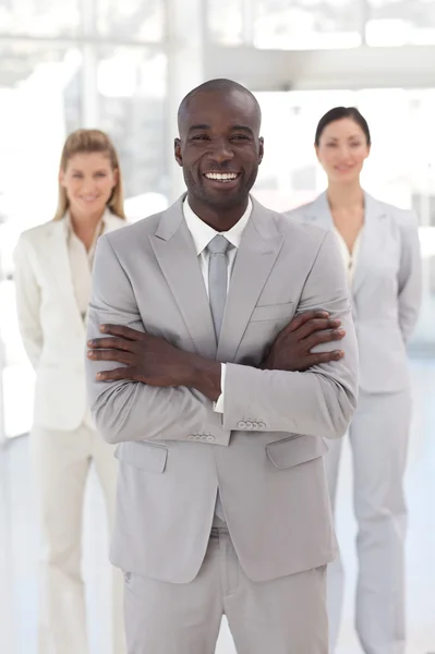 Cute afro-american manager with his team — Stock Photo, Image